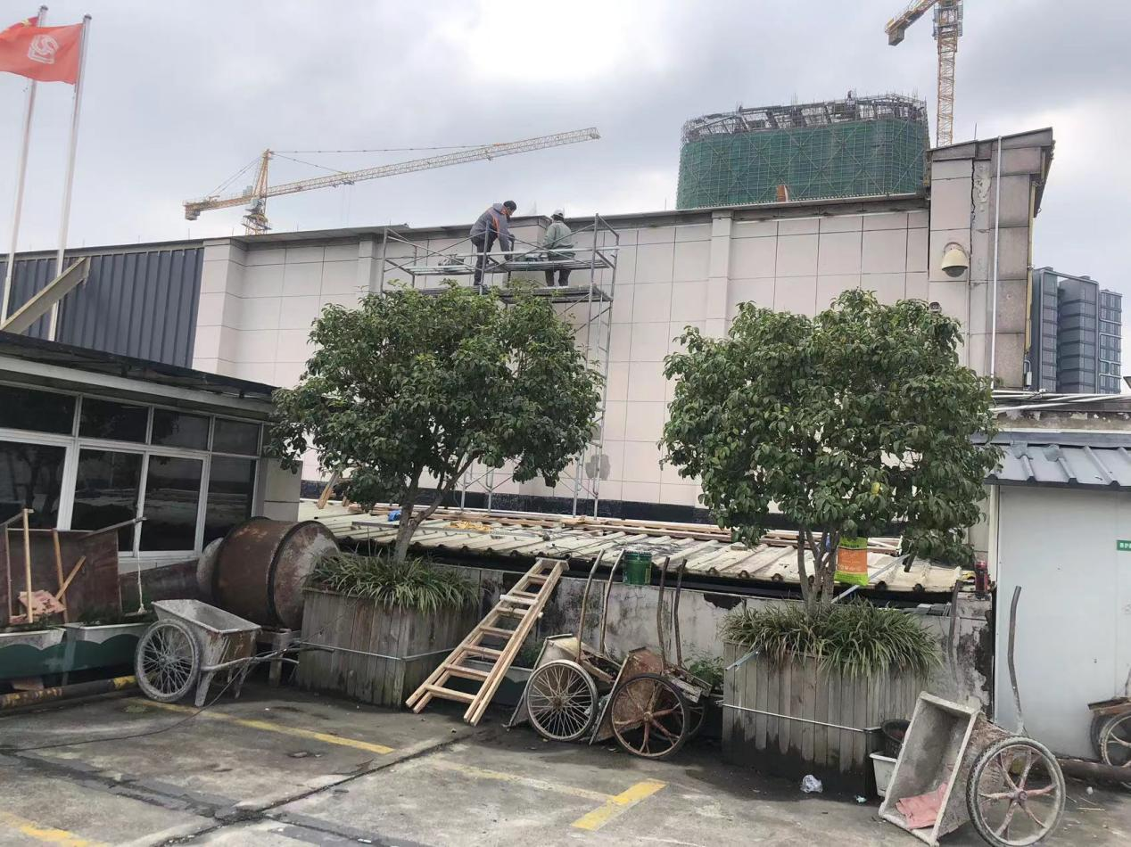 钱江商城开展屋顶花岗岩干挂加固事情